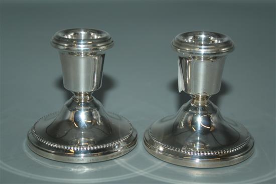 Modern pain or silver dwarf candlesticks, filled, Broadway & Co, 1984